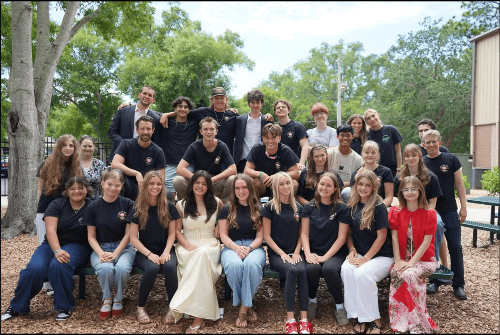 The Gauntlet student newspaper staff and their advisers on campus