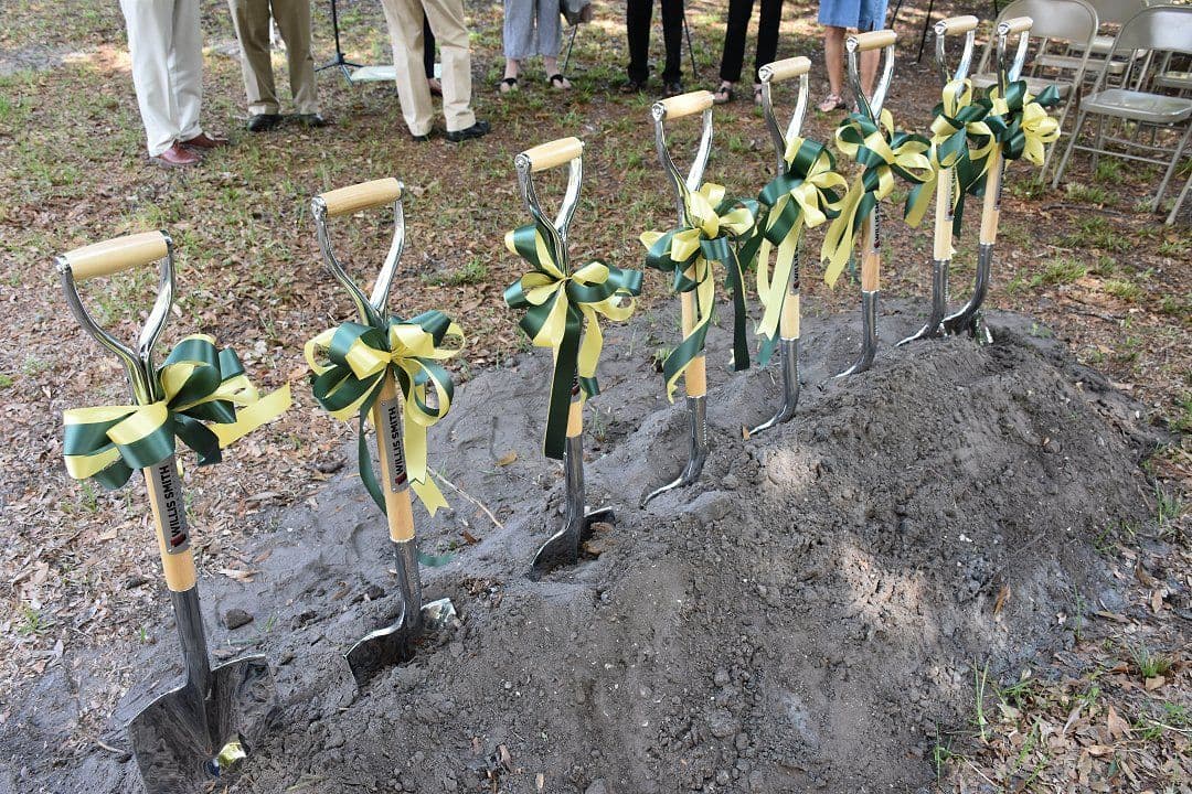 Groundbreaking shovels in the dirt