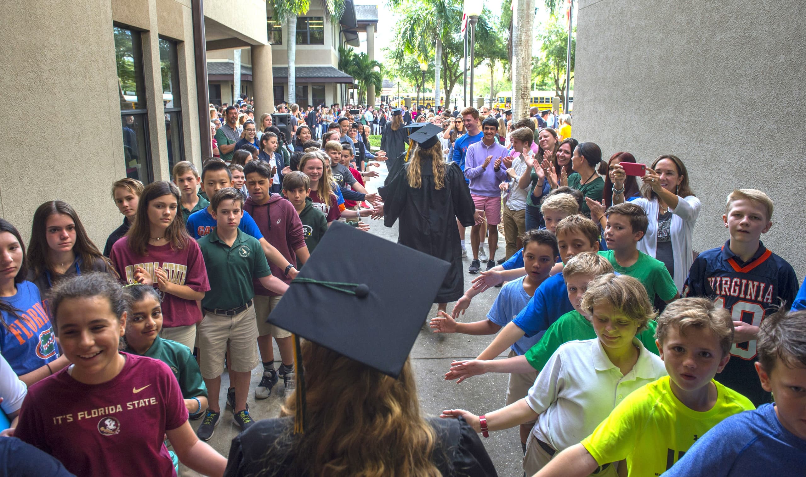 Students greet the seniors during Senior Walk